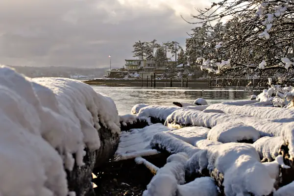 An example of conditions  that challenge typical metering modes. Snowy foreground but with shaded landscape behind.