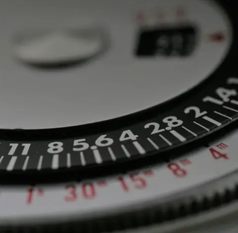 face of an analog light meter