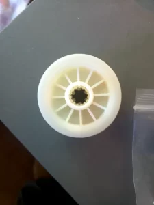 A new washing machine motor drive pulley, splines in tact.